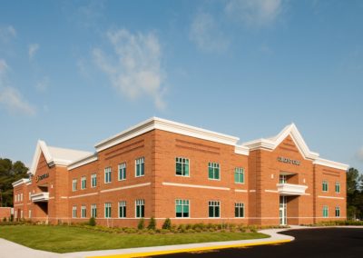 Rendered drawing of Sentara Isle of Wight two-story Multiple Operations Building with an emergency department and surgery facilities