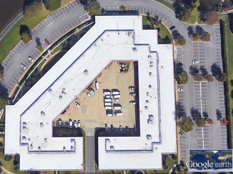 Aerial view of the parking lot and the triangularly arranged building wings that make up the Sentara medical complex