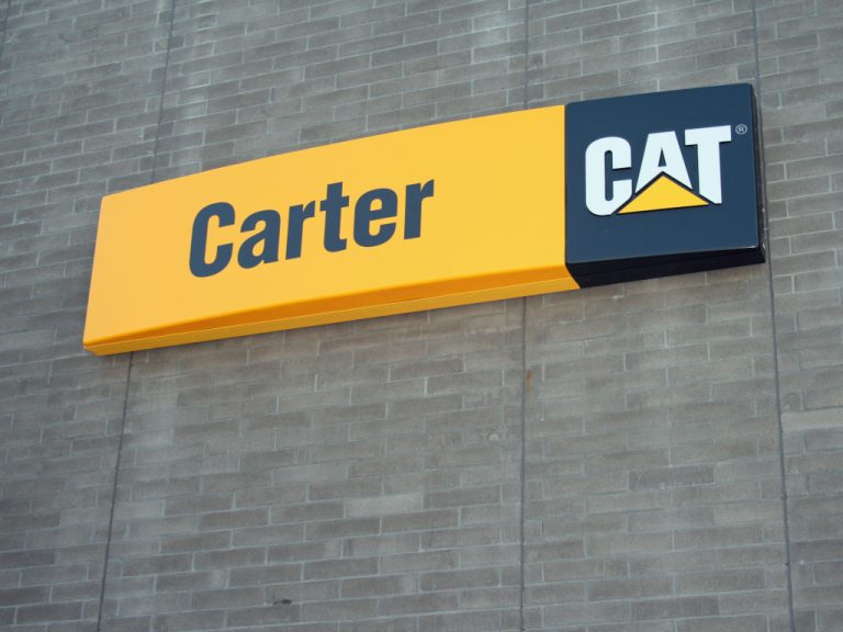 Caterpillar brand colored yellow and black Carter sign outside the Carter shop