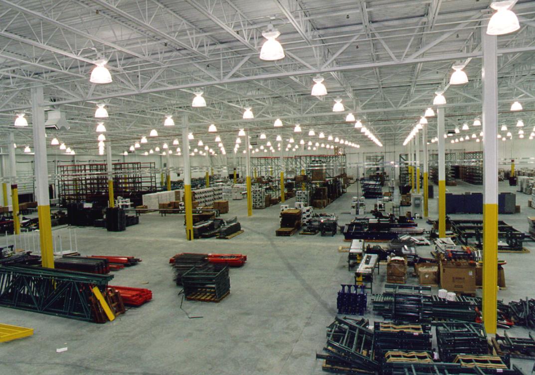 Spanning white trusses and columns in the humongous Gateway Computer Warehouse where we provided electrical design skills and services for the interior lighting in their new addition