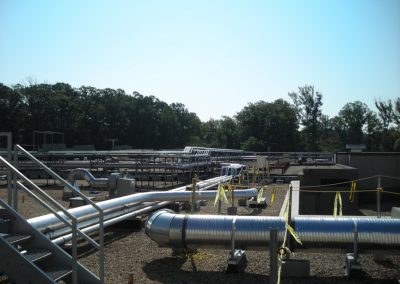 Multiple runs of metal ductwork located across most of the roof of the Riverside Hospital Blood Bank