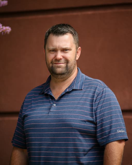 Male professional employee A male Vansant & Gusler engineering professional wearing a casual shirt