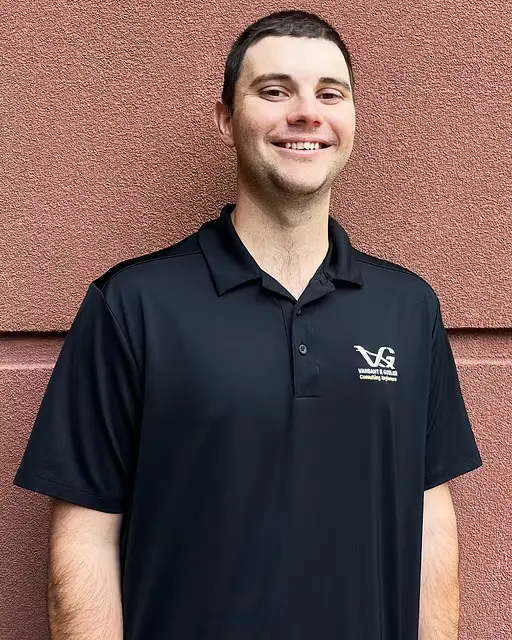 Male casual employee A Vansant & Gusler engineering professional wearing a polo shirt